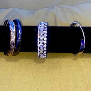 Bracelets. 1 set of 5 and 2 other bracelets.